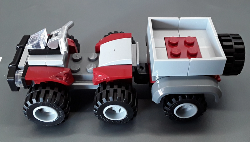 Datei:LEGO 75928 Quad mit Hänger ohne Aufkleber.webp